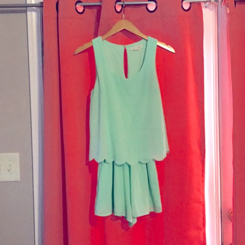 Size small teal shorts jumpsuit.